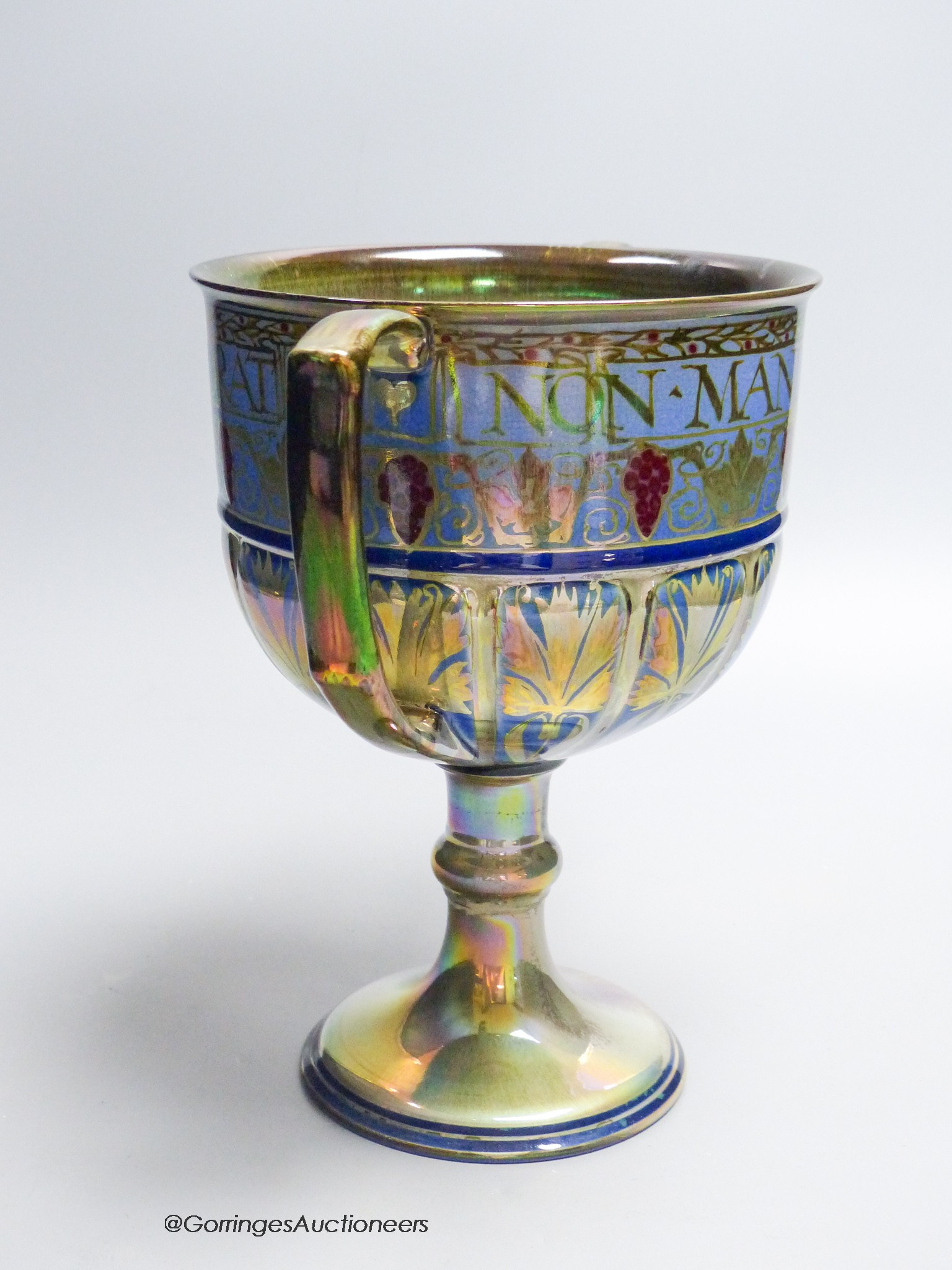 A Pilkingtons Royal Lancastrian lustre loving cup, monogram for Gordon M Forsyth, height 24cm (a.f.)